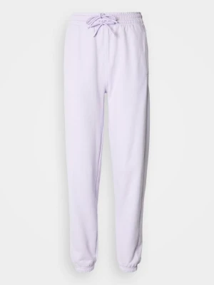 Spodnie treningowe Adidas by Stella McCartney fioletowy