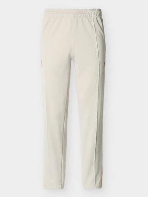 Spodnie treningowe adidas Originals mleczny
