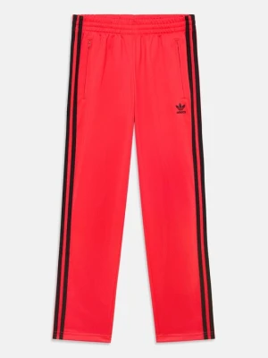 Spodnie treningowe adidas Originals czerwony