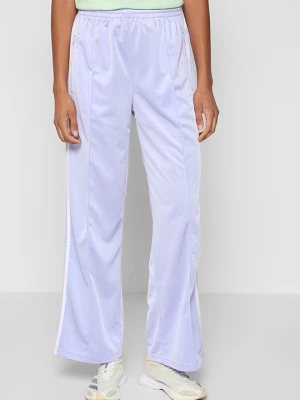 Spodnie treningowe adidas Originals liliowy