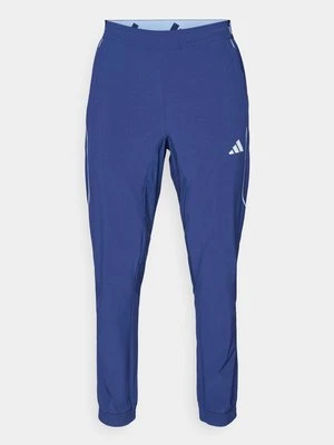 Spodnie treningowe Adidas granatowy