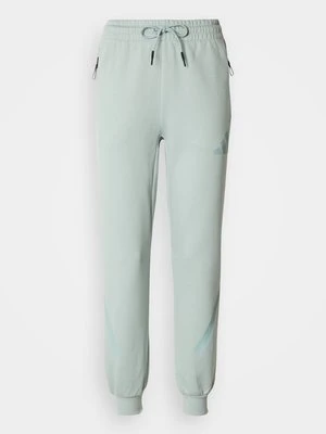 Spodnie treningowe Adidas miętowy