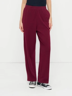 Spodnie treningowe American Vintage ciemnoczerwony