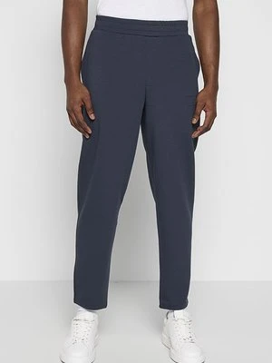 Spodnie treningowe Armani Exchange niebieski
