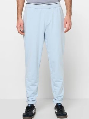 Spodnie treningowe Armani Exchange niebieski