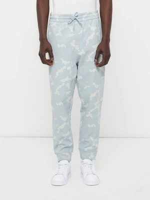 Spodnie treningowe Armani Exchange niebieski