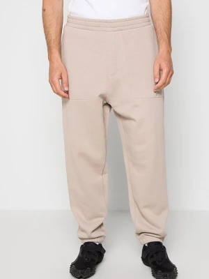 Spodnie treningowe Armani Exchange beżowy