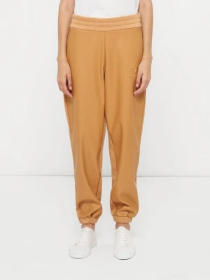 Spodnie treningowe Armani Exchange jasny brąz