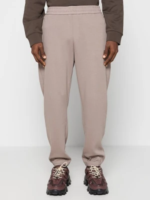Spodnie treningowe Armani Exchange ciemnobrązowy