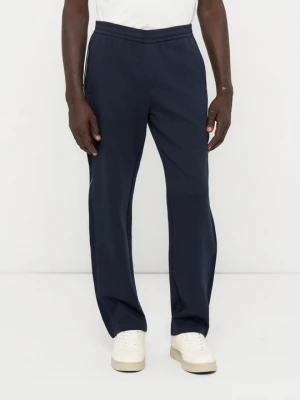 Spodnie treningowe Armani Exchange granatowy