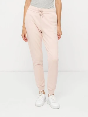 Spodnie treningowe Armani Exchange jasnoróżowy