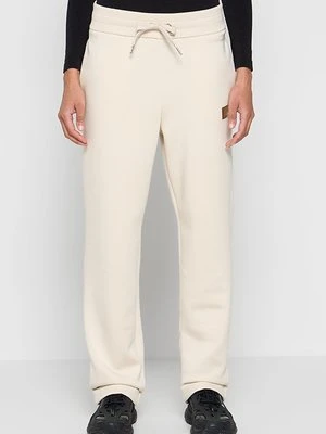 Spodnie treningowe Armani Exchange mleczny