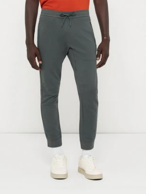 Spodnie treningowe Armani Exchange zielony