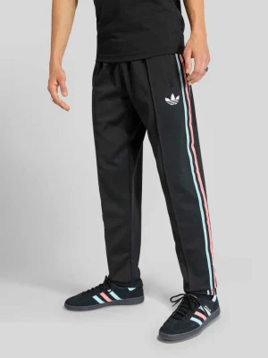 Spodnie treningowe Belgia o kroju regular fit z mieszanki bawełny adidas Originals