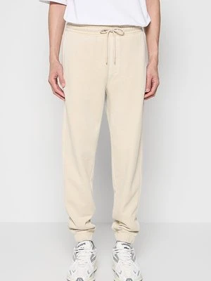 Spodnie treningowe Calvin Klein Jeans beżowy