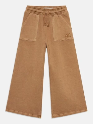 Spodnie treningowe Calvin Klein Jeans jasny brąz