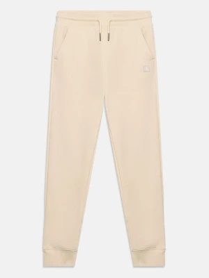 Spodnie treningowe Calvin Klein Jeans piaskowy