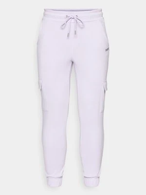 Spodnie treningowe DKNY liliowy
