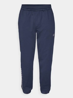 Spodnie treningowe EA7 Emporio Armani niebieski