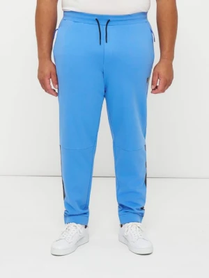 Spodnie treningowe EA7 Emporio Armani jasnoniebieski