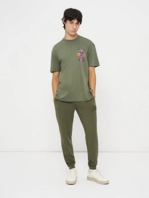 Spodnie treningowe EA7 Emporio Armani jasnozielony