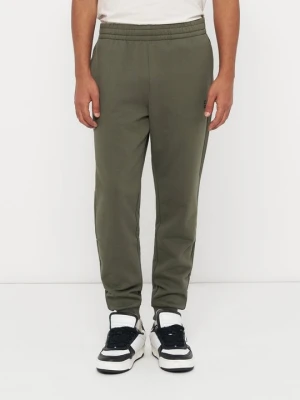 Spodnie treningowe EA7 Emporio Armani jasnozielony