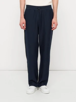 Spodnie treningowe EA7 Emporio Armani niebieski
