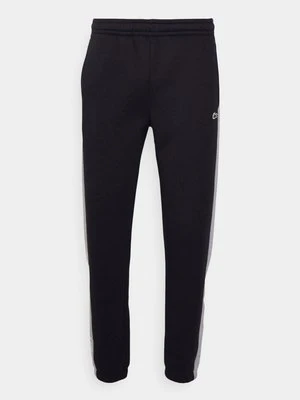 Zdjęcie produktu Spodnie treningowe Lacoste