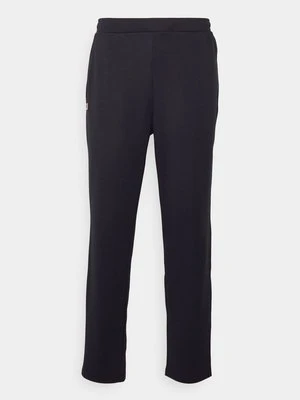 Spodnie treningowe Lacoste granatowy