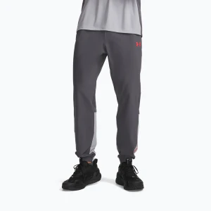 Spodnie treningowe męskie Under Armour Tech Utility Woven Pants castlerock / mod gray / racer red Szary