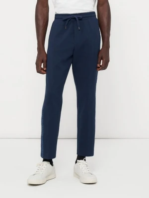 Spodnie treningowe Michael Kors granatowy
