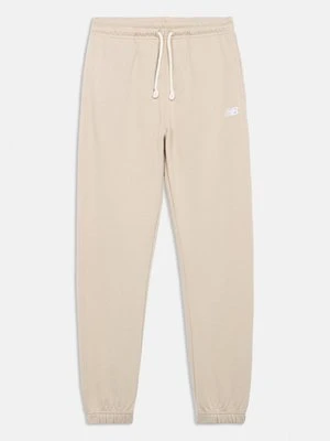 Spodnie treningowe New Balance beżowy