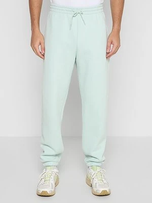 Spodnie treningowe New Balance jasnozielony