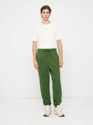 Spodnie treningowe New Balance zielony