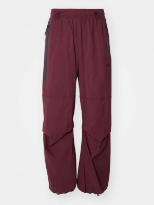Spodnie treningowe Nike bordowy