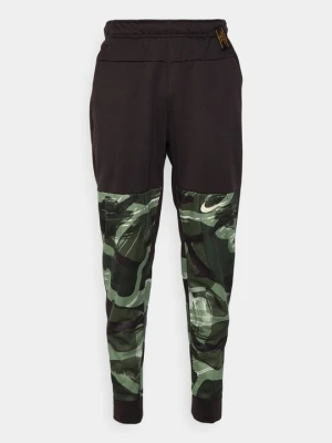 Spodnie treningowe Nike brązowy