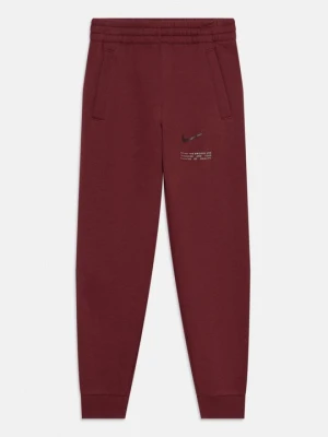 Spodnie treningowe Nike ciemnoczerwony