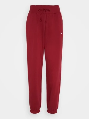 Spodnie treningowe Nike czerwony