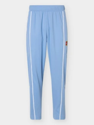 Spodnie dresowe Nike jasnoniebieski