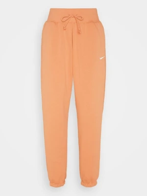 Spodnie treningowe Nike jasnobrązowy
