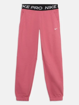 Spodnie treningowe Nike koralowy