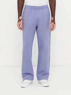 Spodnie treningowe Nike liliowy