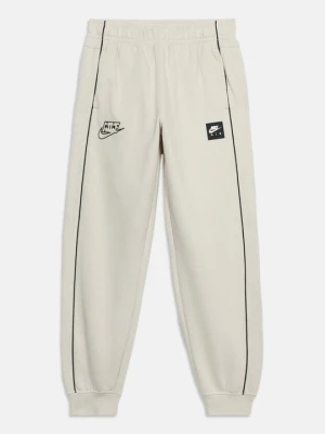 Spodnie treningowe Nike mleczny