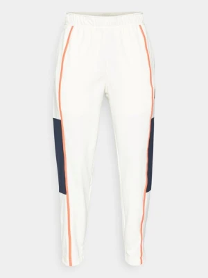 Spodnie treningowe Nike mleczny