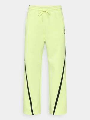 Spodnie treningowe Nike jasnożółty