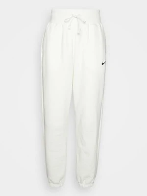 Spodnie treningowe Nike mleczny