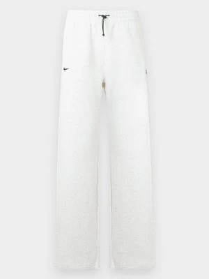 Spodnie treningowe Nike mleczny