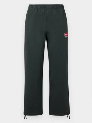 Spodnie treningowe Nike ciemnozielony