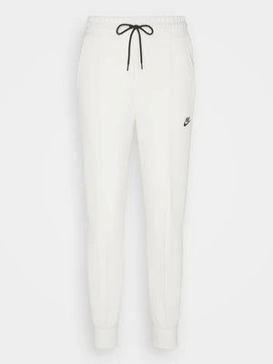 Spodnie treningowe Nike beżowy