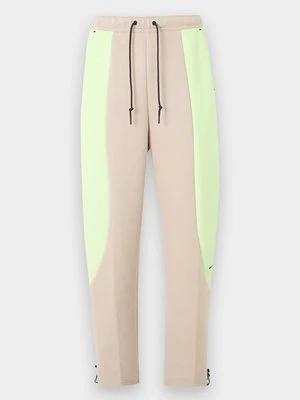 Spodnie treningowe Nike beżowy